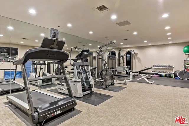 a view of a room with gym equipment