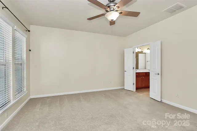 a bathroom with a sink double vanity and shower