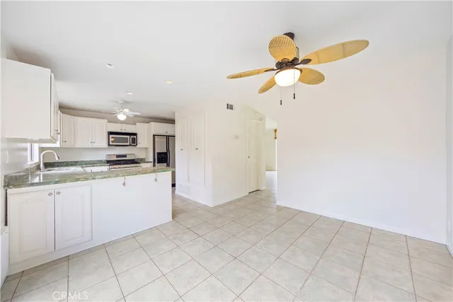a view of a livingroom with a fan