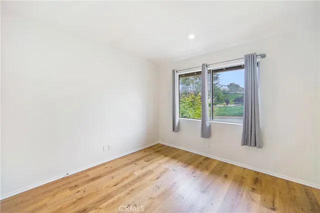 a view of a backyard with a garden and plants