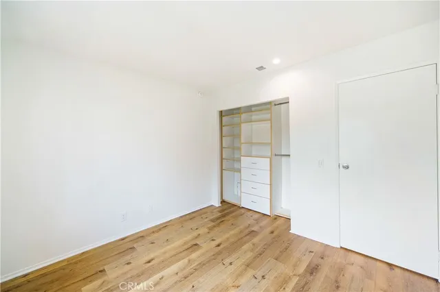 a view of house with outdoor space porch and garden