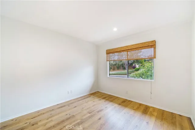 a view of a city with green space