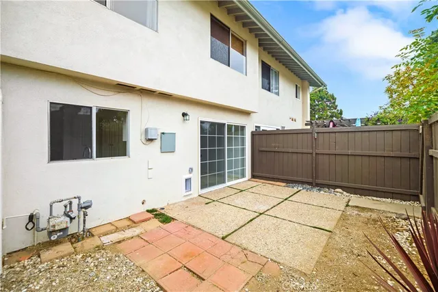 a view of a houses with a snow in front of the house