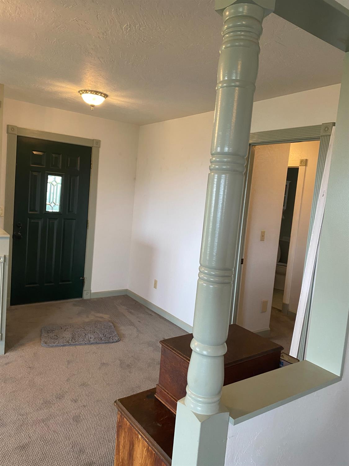 5021 Banbury Cross Road Shingle Springs, CA 95682 - Photo 40 of 92 Front door view and door which leads to side hall, bathroom, laundry room and office/library/4th bdrm.