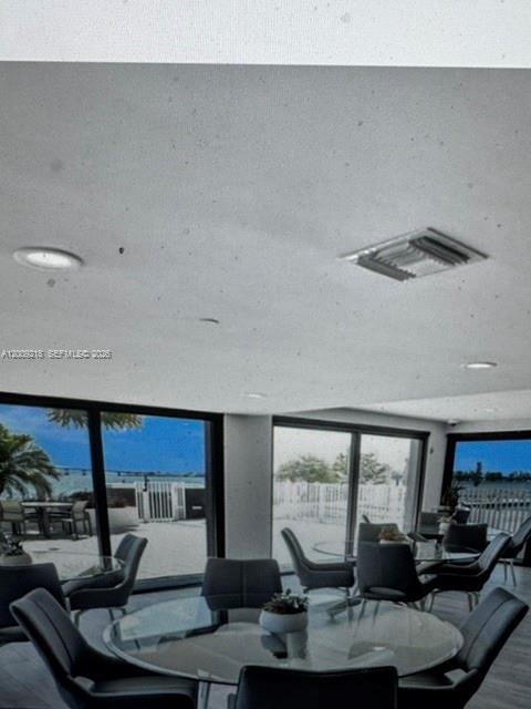 200 Southeast 15th Road, Unit PHF Miami, FL 33129 - Photo 7 of 8 a room with furniture and a large window
