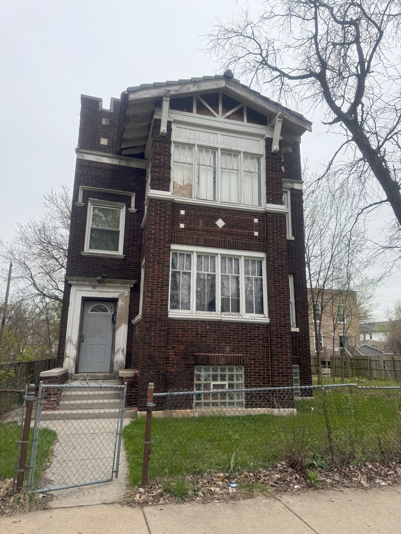 7431 South Kimbark Avenue Chicago, IL 60619 - Photo 12 of 12 a front view of a house