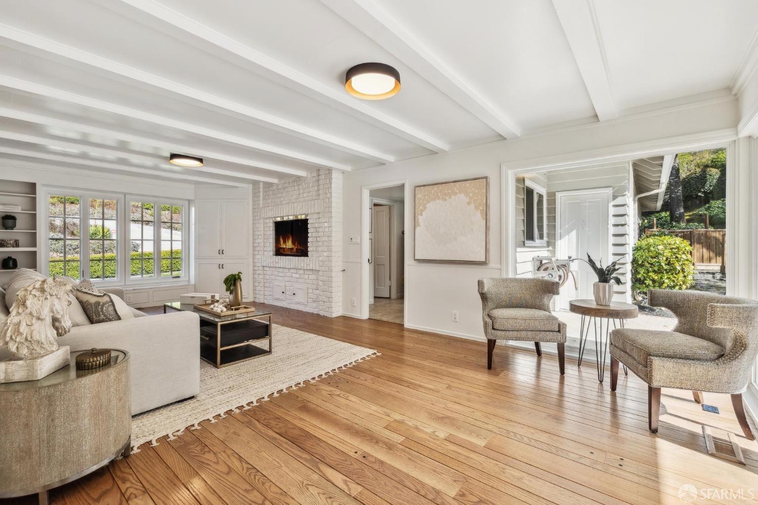 4 La Cuesta Road Orinda, CA 94563 - Photo 15 of 50 a living room with furniture and wooden floor