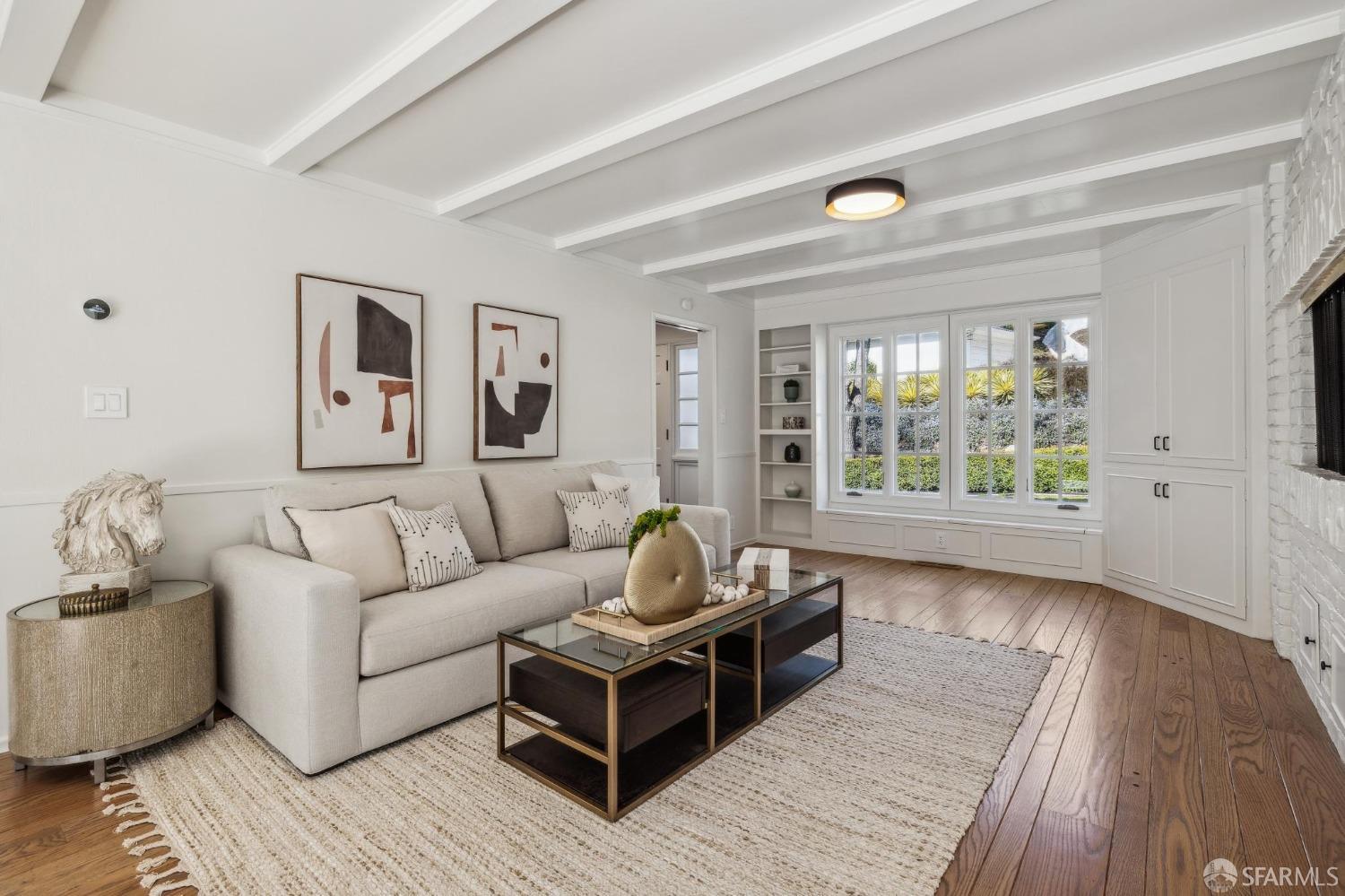 4 La Cuesta Road Orinda, CA 94563 - Photo 16 of 50 a living room with furniture and wooden floor