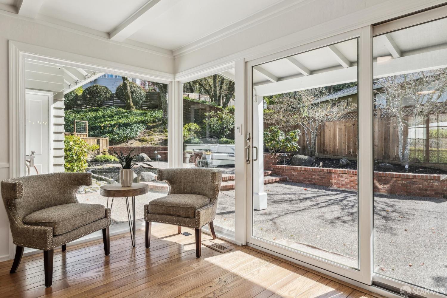 4 La Cuesta Road Orinda, CA 94563 - Photo 18 of 50 a living room with furniture and a floor to ceiling window
