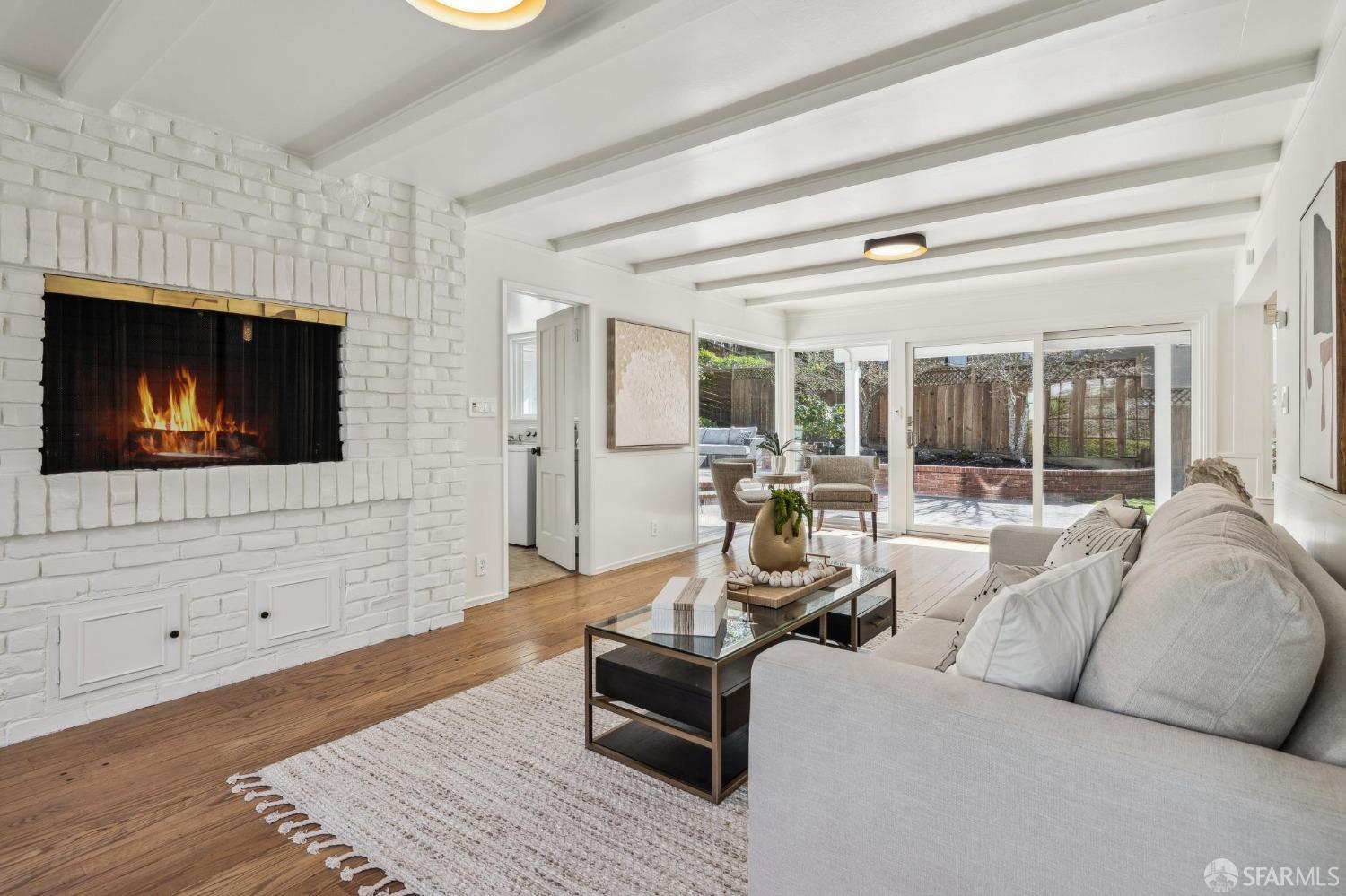 4 La Cuesta Road Orinda, CA 94563 - Photo 19 of 50 a living room with furniture and a flat screen tv