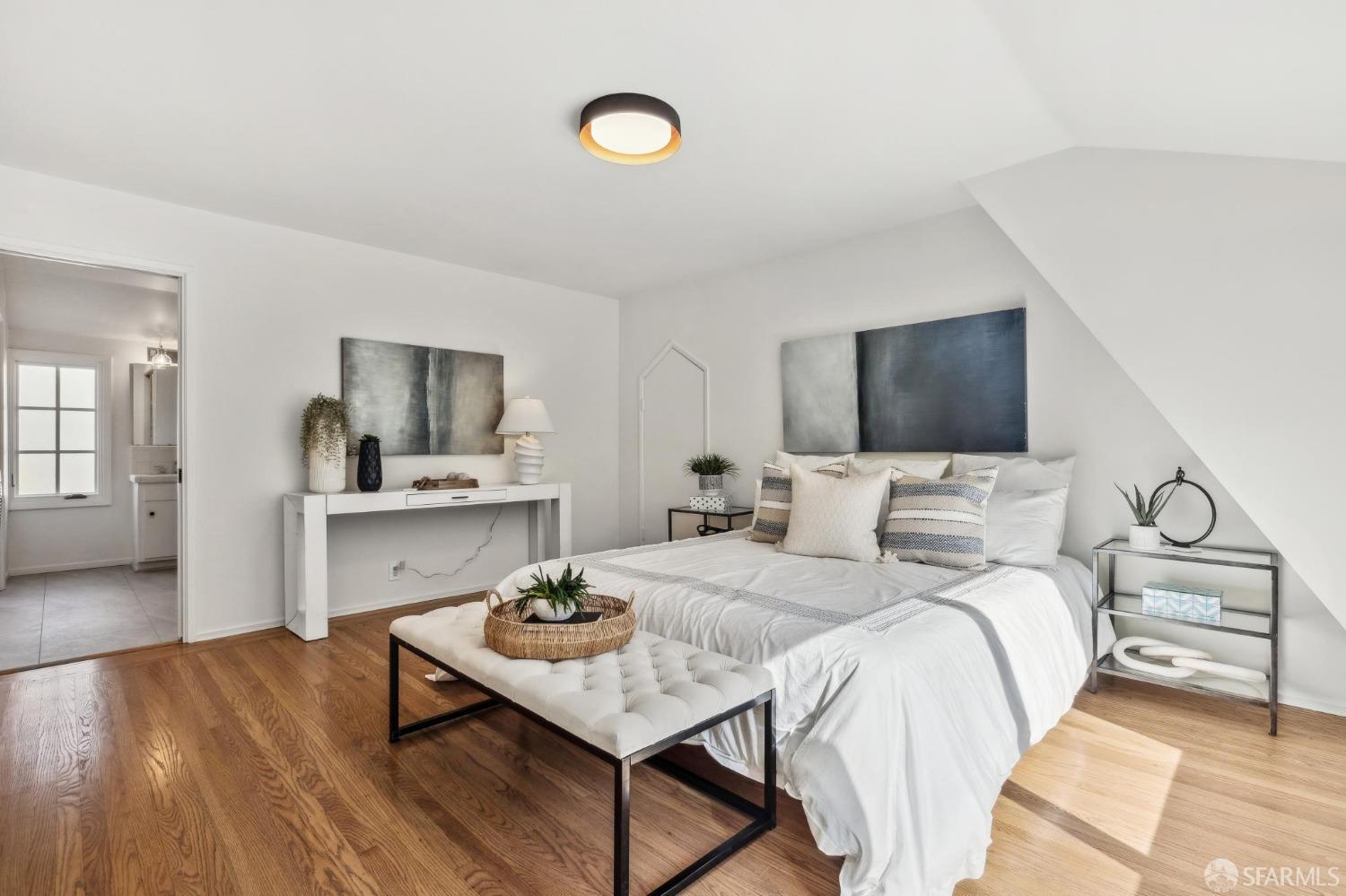 4 La Cuesta Road Orinda, CA 94563 - Photo 21 of 50 a bedroom with a bed and a flat screen tv