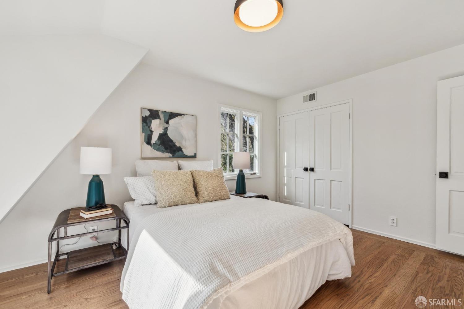 4 La Cuesta Road Orinda, CA 94563 - Photo 30 of 50 a bedroom with a bed and a painting on the wall