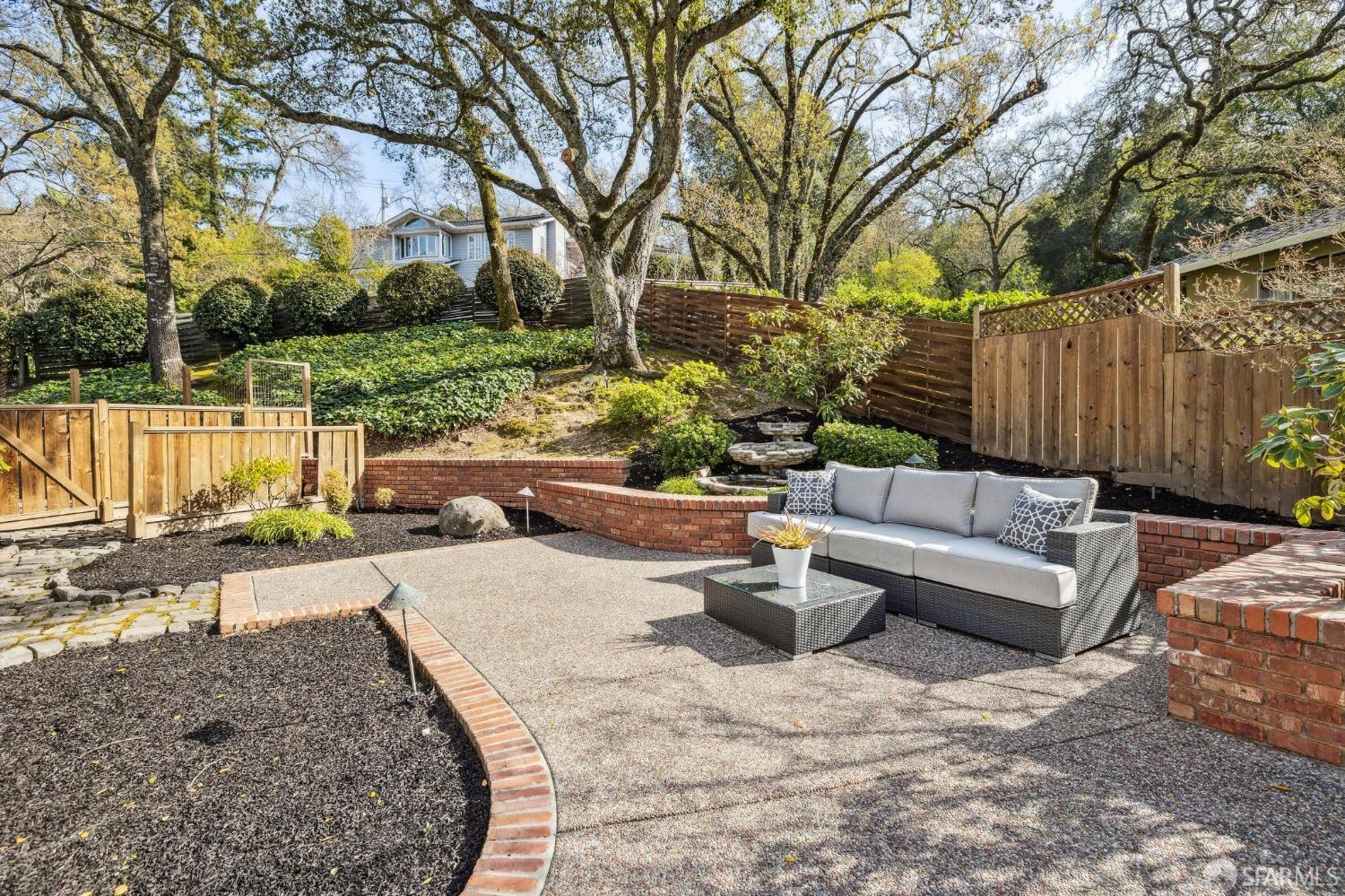 4 La Cuesta Road Orinda, CA 94563 - Photo 40 of 50 a view of a backyard with couches and potted plants
