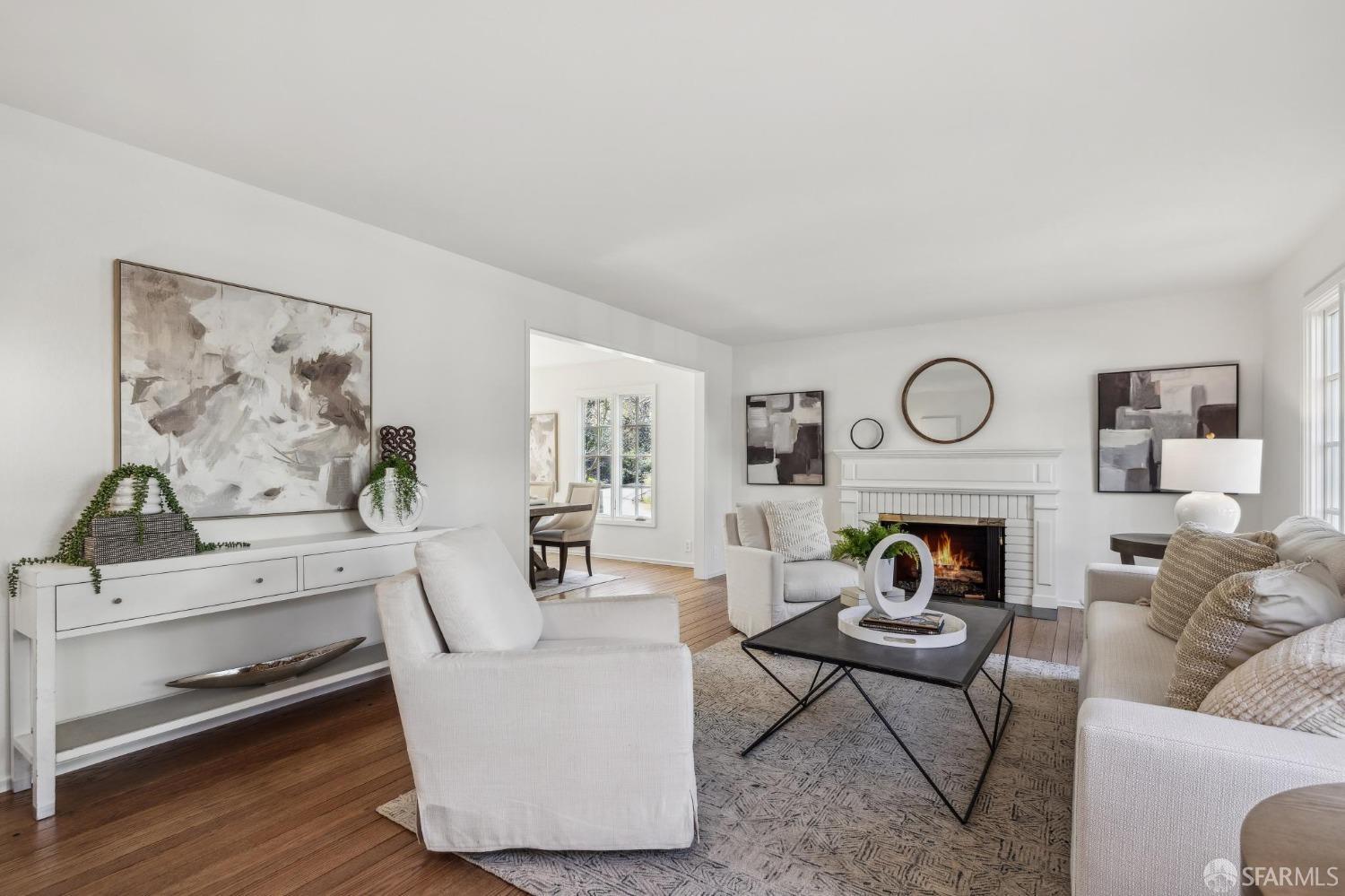 4 La Cuesta Road Orinda, CA 94563 - Photo 4 of 50 a living room with furniture and a fireplace