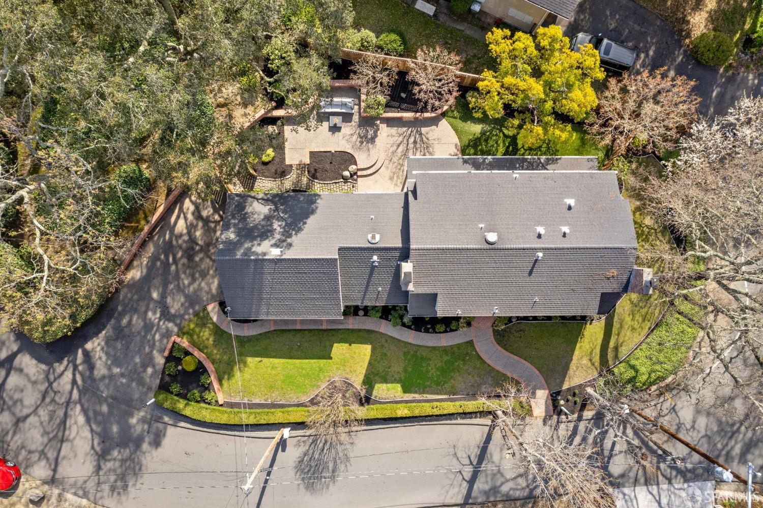 4 La Cuesta Road Orinda, CA 94563 - Photo 44 of 50 an aerial view of a house with swimming pool and large trees