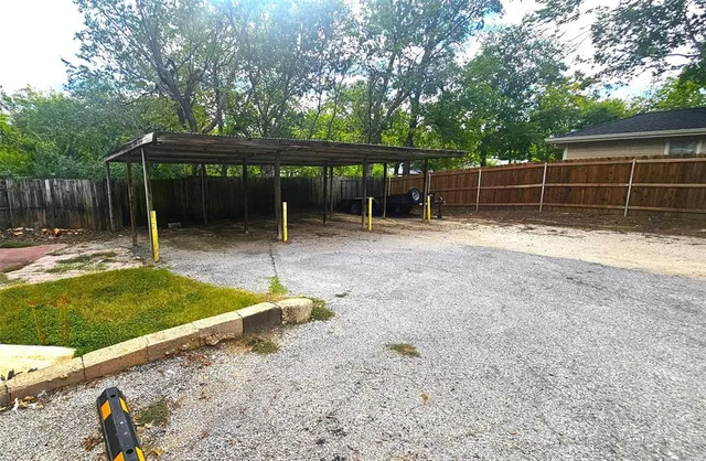 a car parked in front of a house