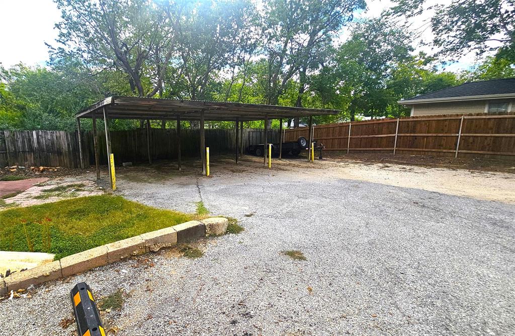 1015 South Welch Street, Unit A Denton, TX 76201 - Photo 19 of 21 a backyard of a house with barbeque oven