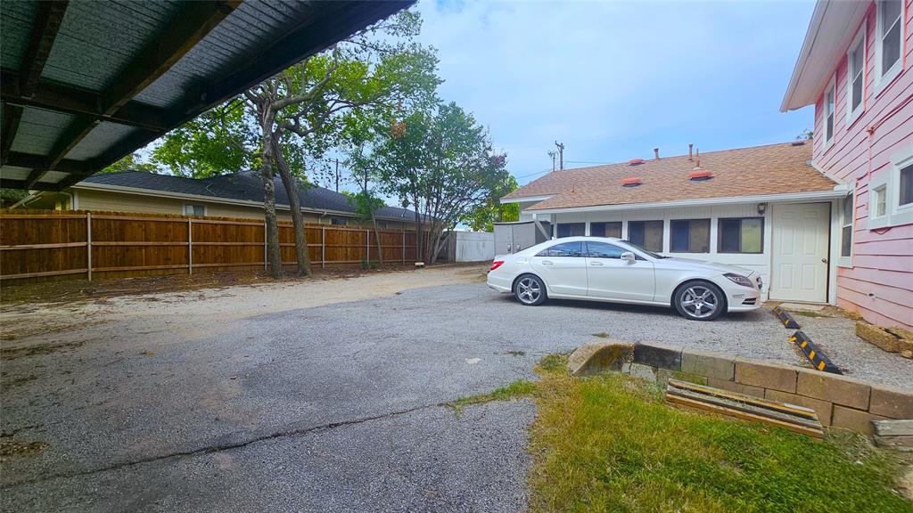 1015 South Welch Street, Unit A Denton, TX 76201 - Photo 20 of 21 a car parked in front of a house