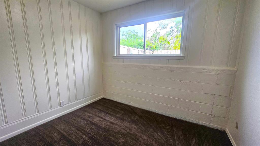 1015 South Welch Street, Unit A Denton, TX 76201 - Photo 4 of 21 a view of empty room with window