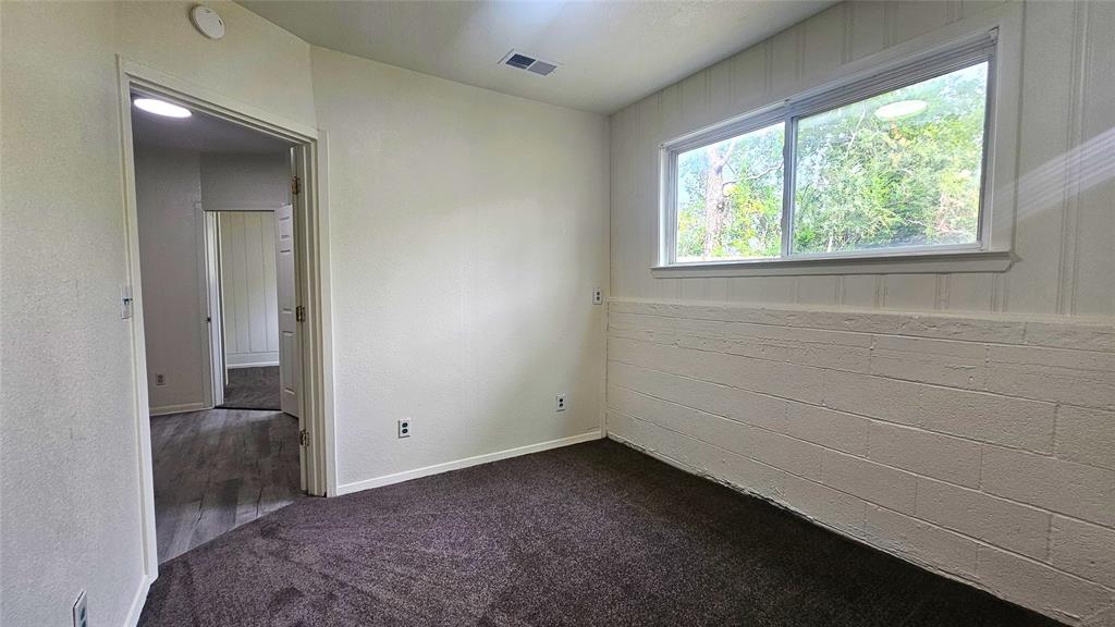 1015 South Welch Street, Unit A Denton, TX 76201 - Photo 7 of 21 a view of room and window