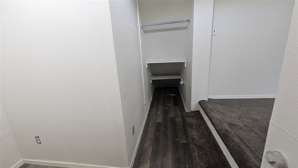 1015 South Welch Street, Unit A Denton, TX 76201 - Photo 9 of 21 a view of a hallway and wooden floor