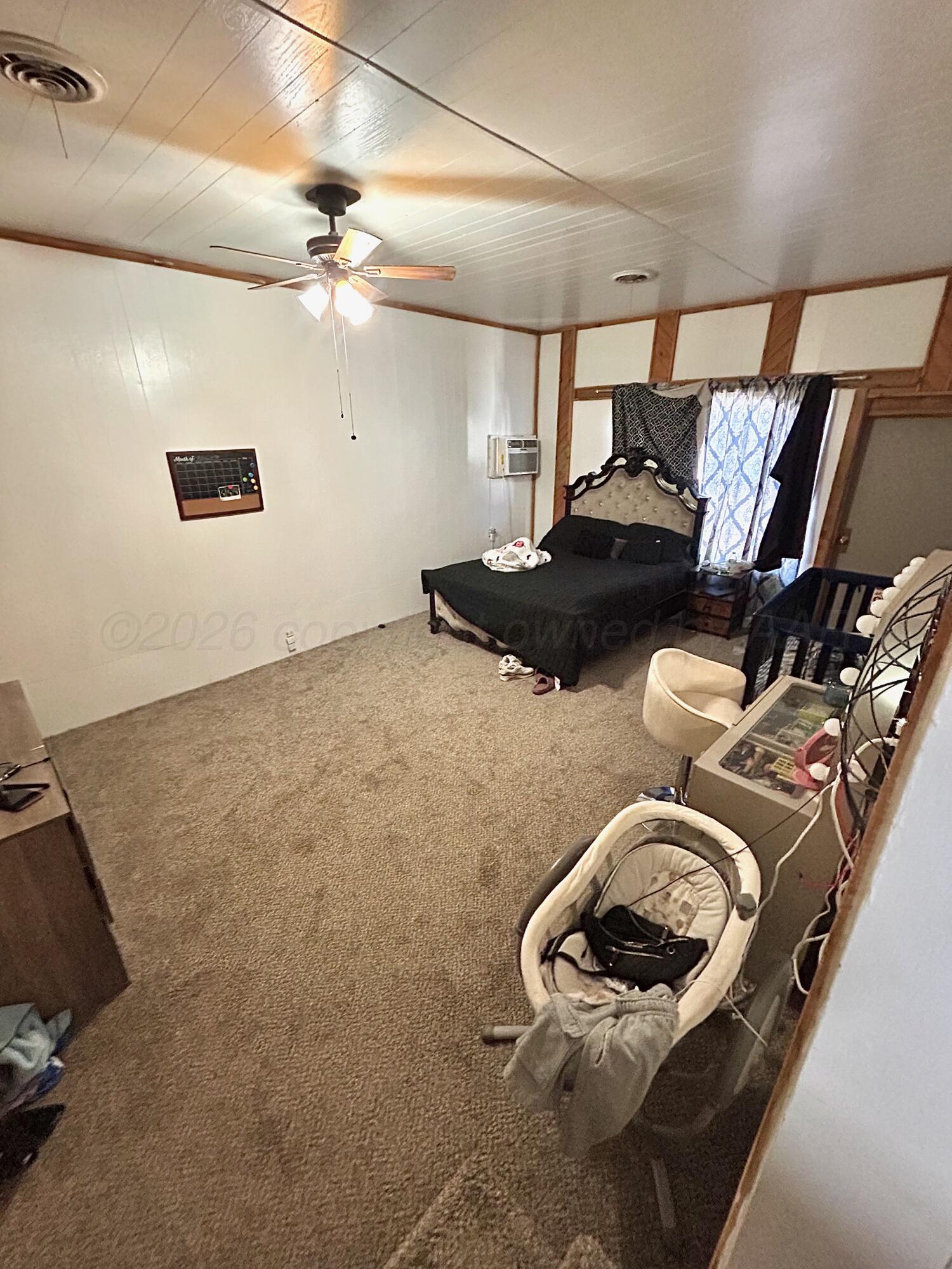 101 Gaines Street Claude, TX 79019 - Photo 5 of 18 a view of a room with gym equipment