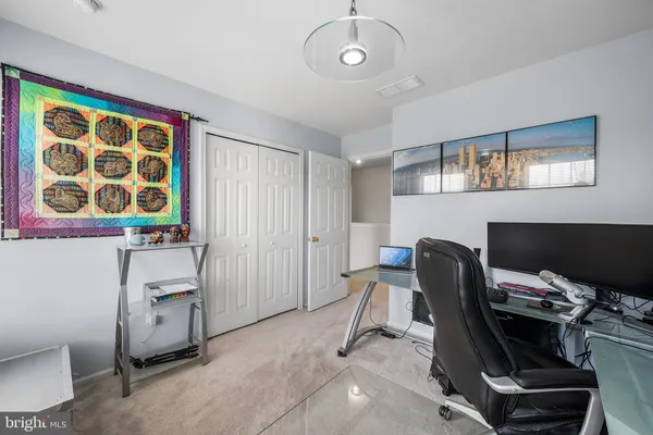 a workspace with furniture and window