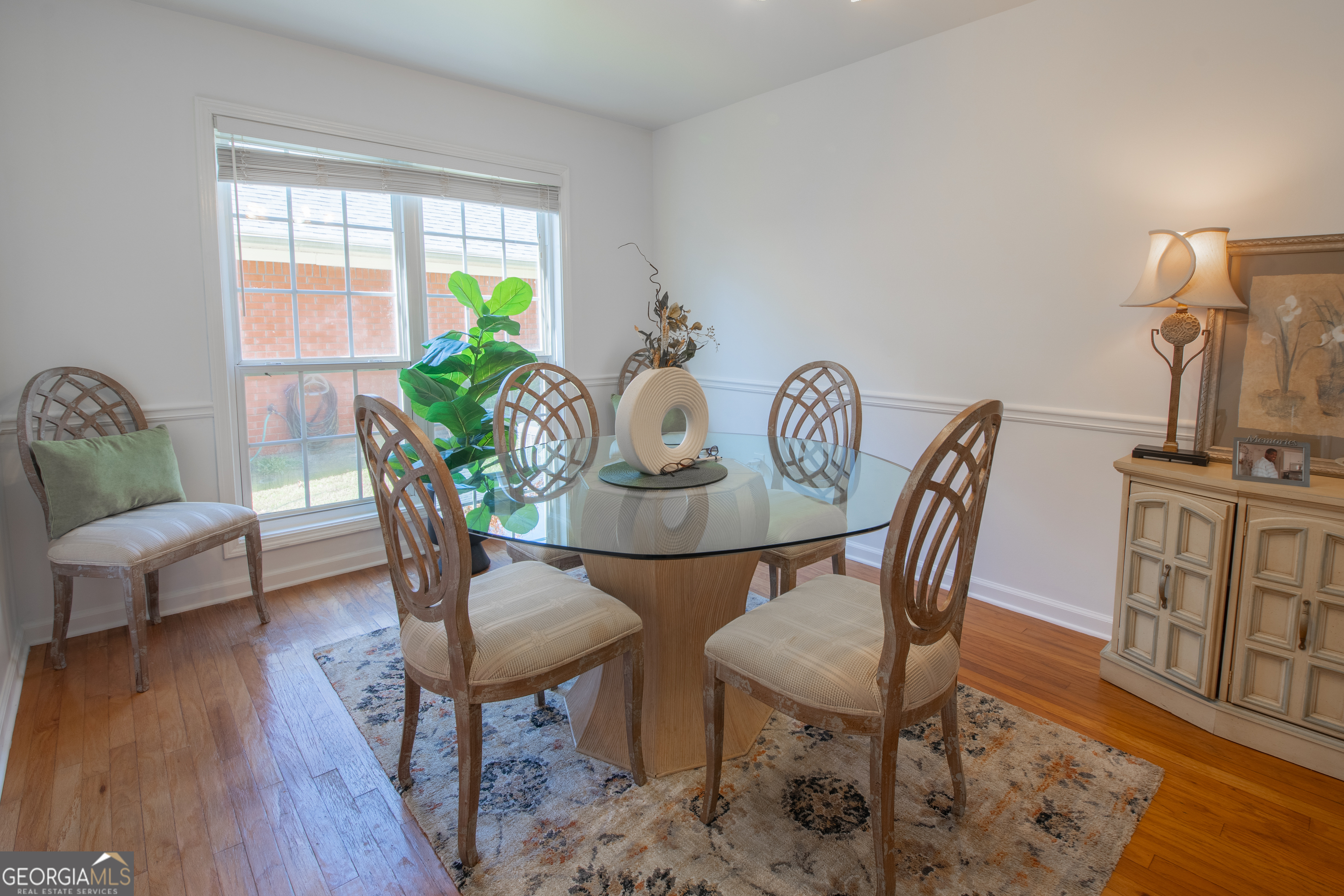 117 Covington Place Athens, GA 30606 - Photo 11 of 33 a view of a dining room with furniture window and wooden floor
