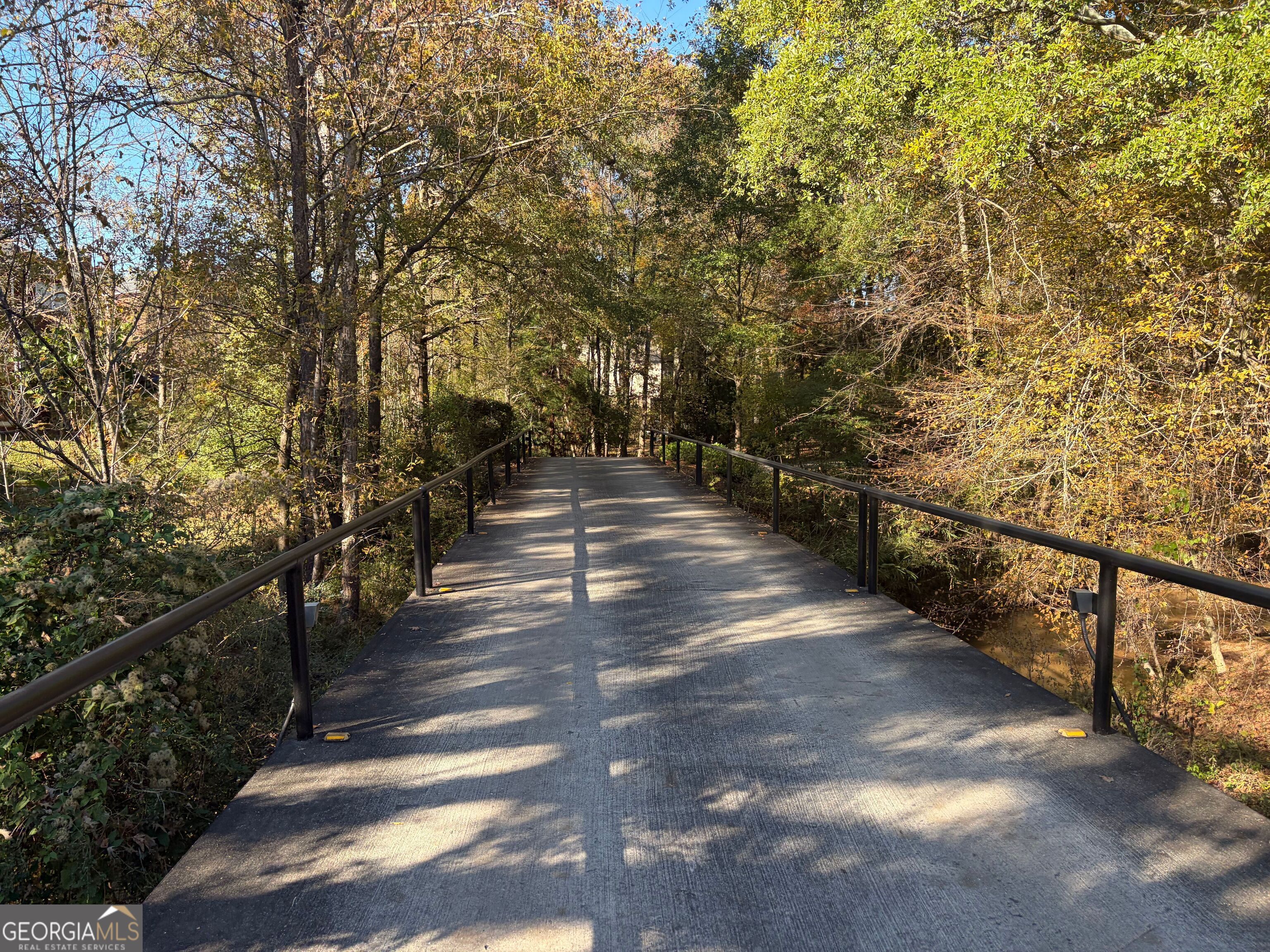 117 Covington Place Athens, GA 30606 - Photo 28 of 33 a view of a pathway with a wrought fence