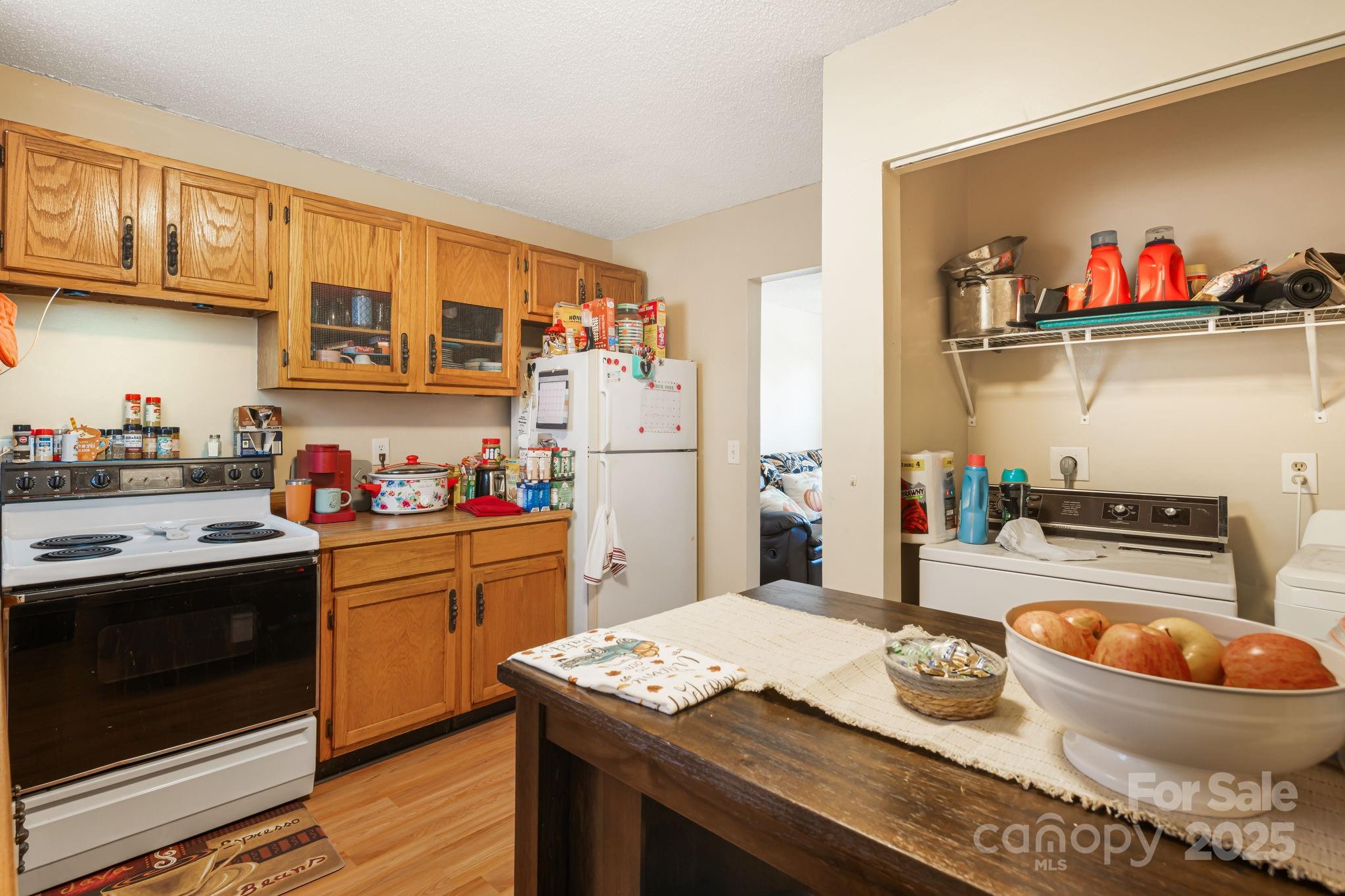 645 Flint Hill Road Alexander, NC 28701 - Photo 18 of 30 a kitchen with a appliances and cabinets