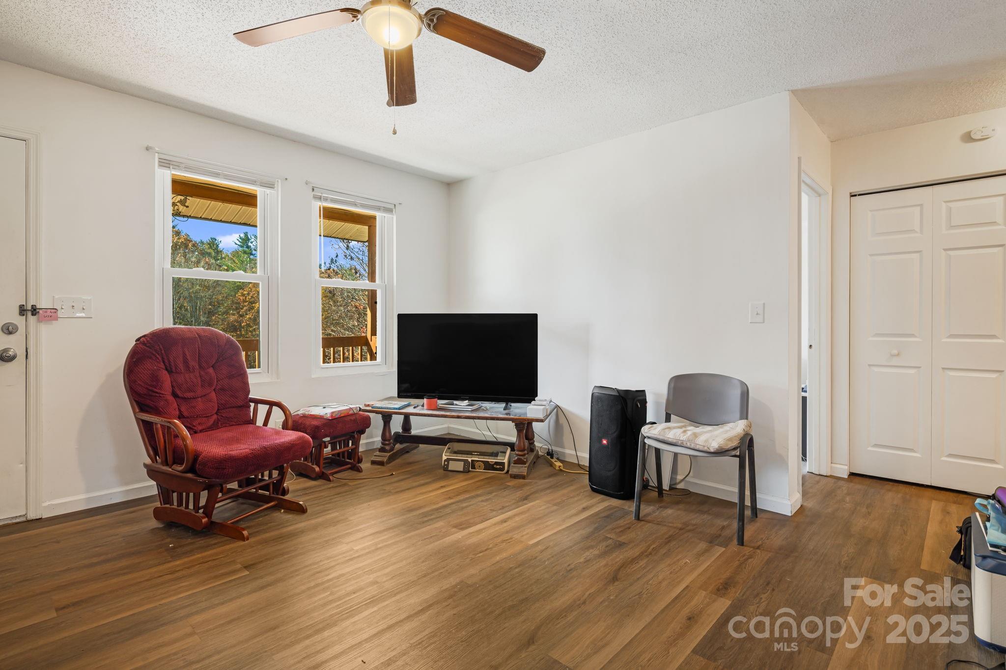 645 Flint Hill Road Alexander, NC 28701 - Photo 5 of 30 a living room with furniture