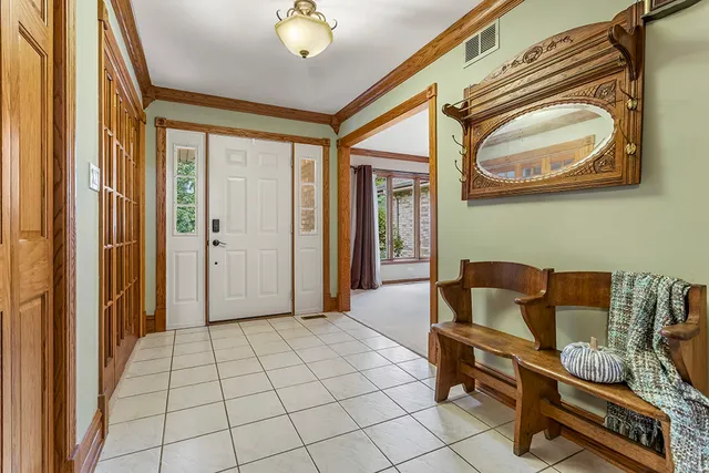 a view of a livingroom with furniture and a window