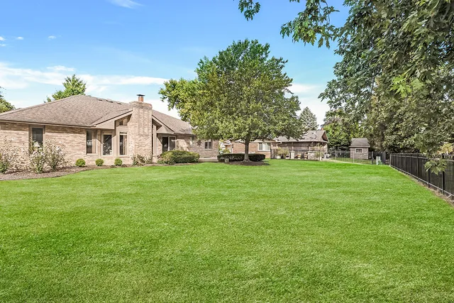 a view of a house with a big yard