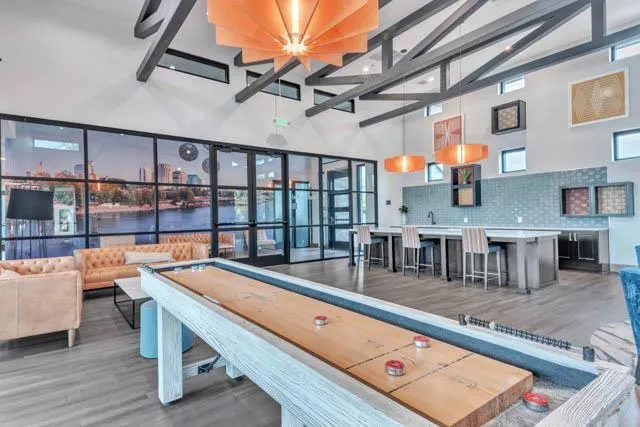 a view of dining room with furniture window and wooden floor