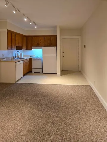 a view of a kitchen with a sink