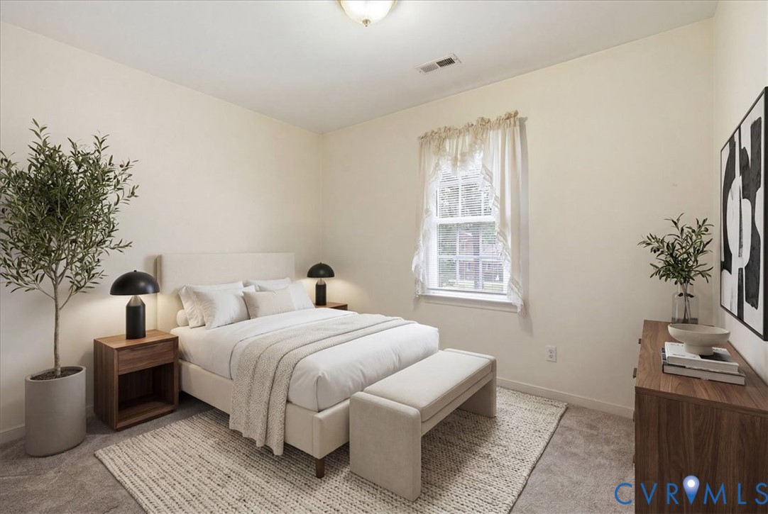 13308 South Chester Road Chester, VA 23831 - Photo 27 of 41 Serene primary bedroom showcasing neutral wall fin