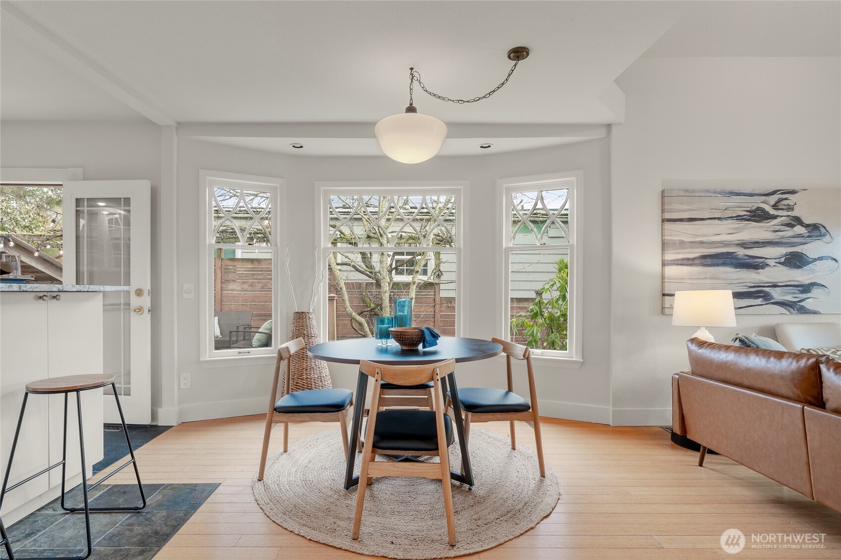 910 Northwest 64th Street Seattle, WA 98107 - Photo 12 of 31 a living room with furniture and a large window