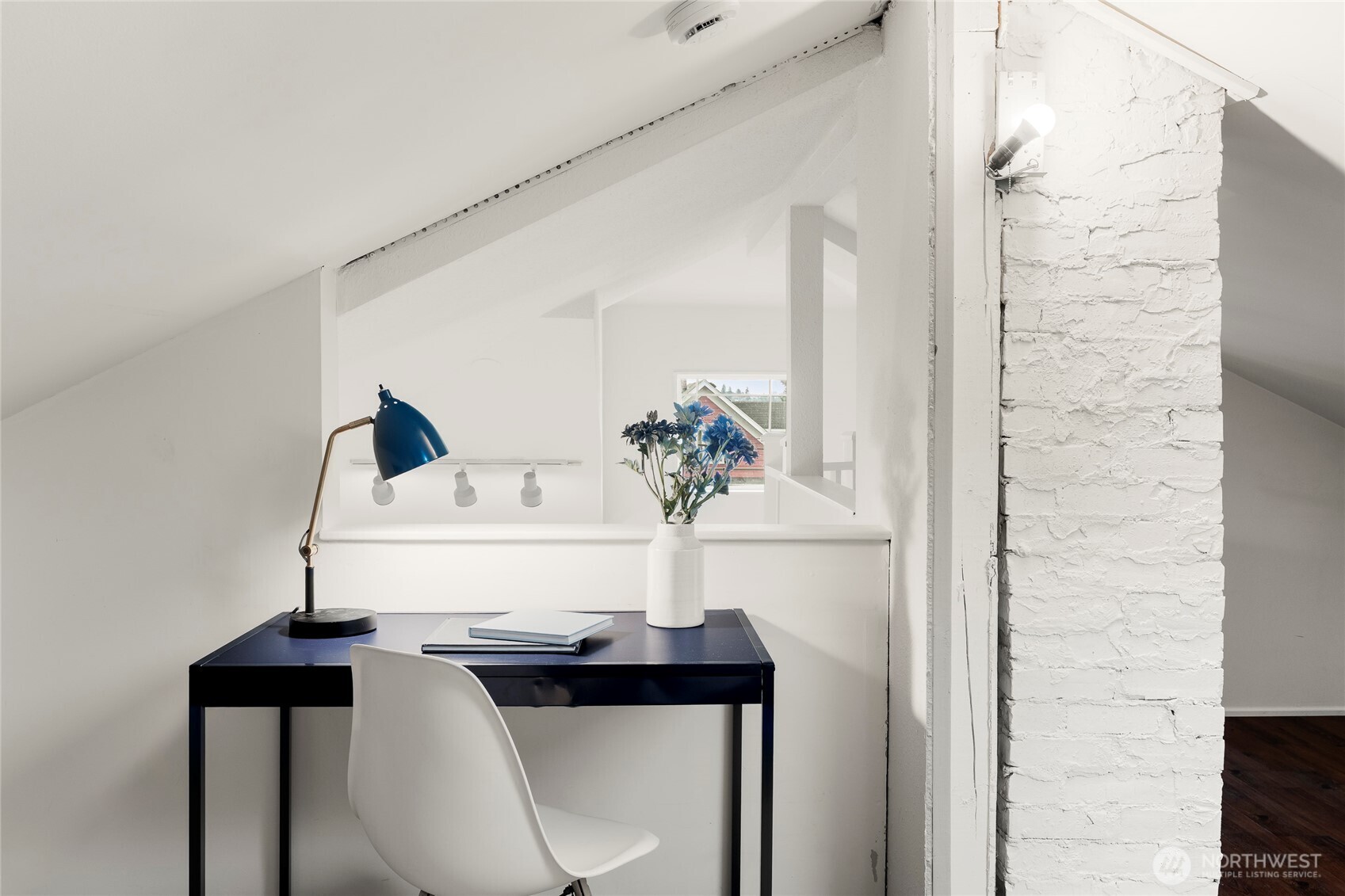 910 Northwest 64th Street Seattle, WA 98107 - Photo 21 of 31 a view of bathroom with a sink and a mirror