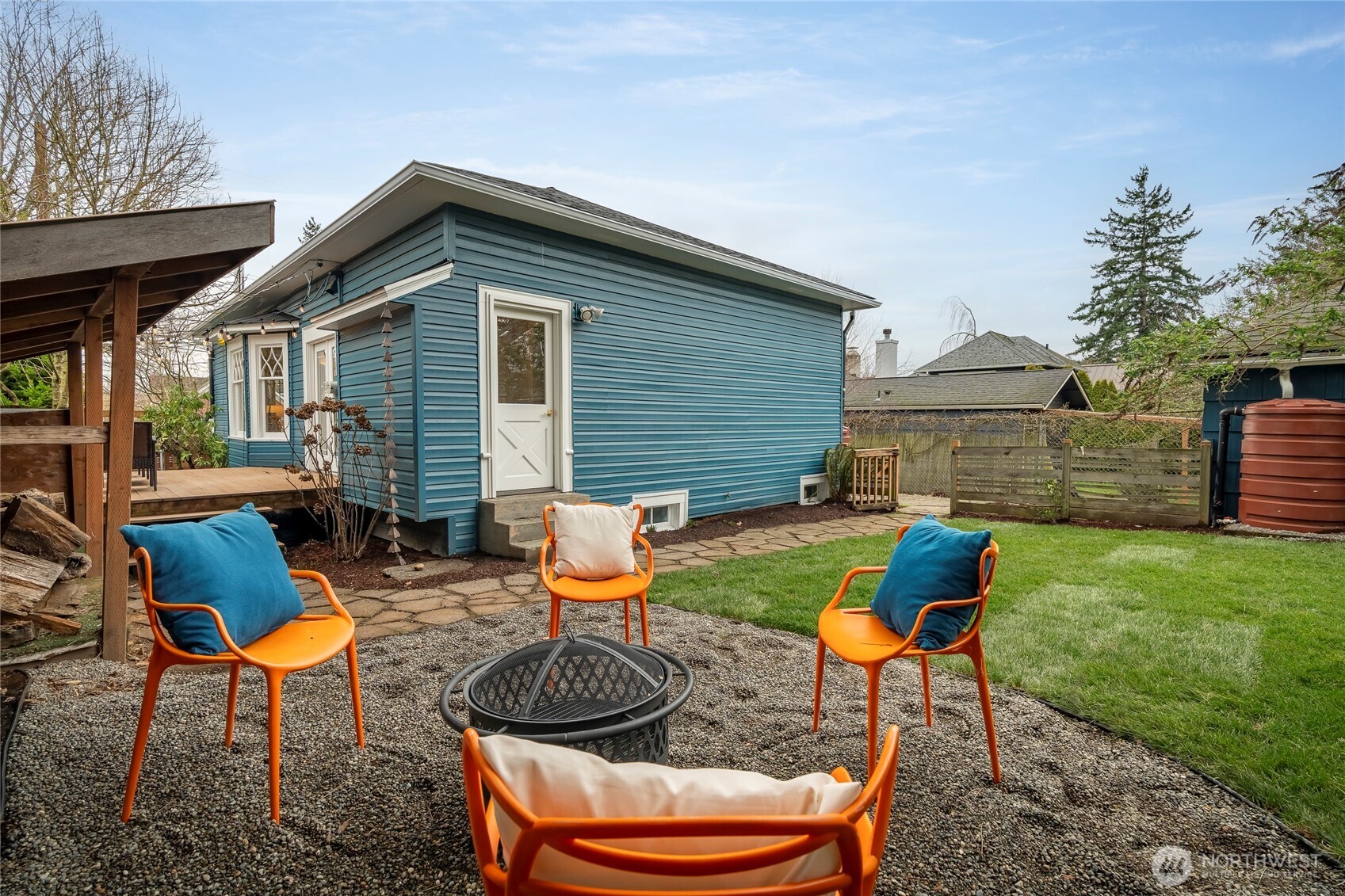 910 Northwest 64th Street Seattle, WA 98107 - Photo 24 of 31 a backyard of a house with outdoor seating