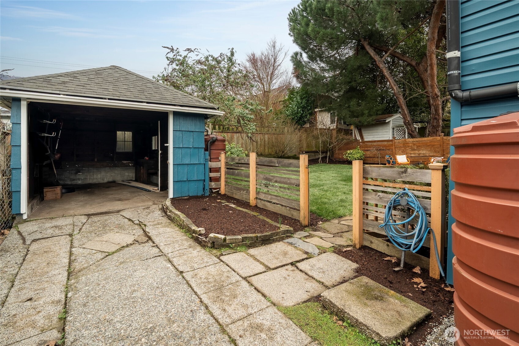 910 Northwest 64th Street Seattle, WA 98107 - Photo 26 of 31 a front view of a house with garden