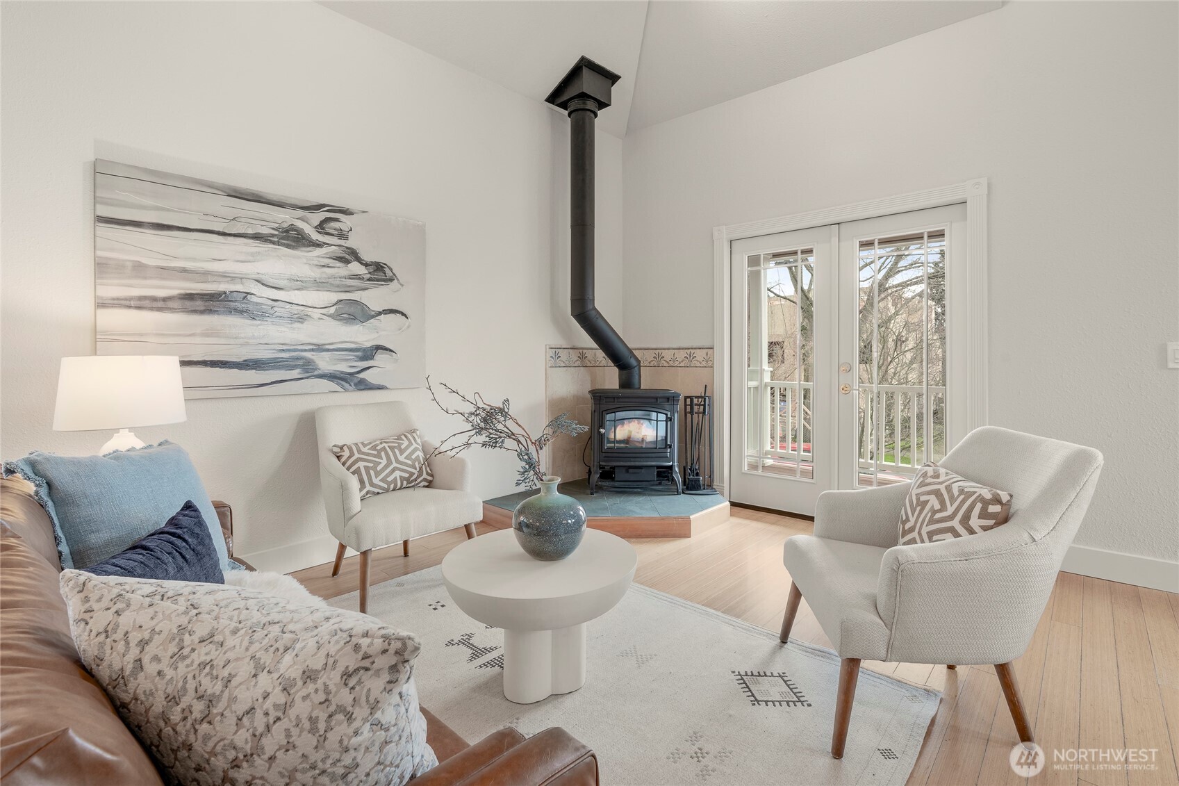 910 Northwest 64th Street Seattle, WA 98107 - Photo 3 of 31 a living room with furniture a rug and a window