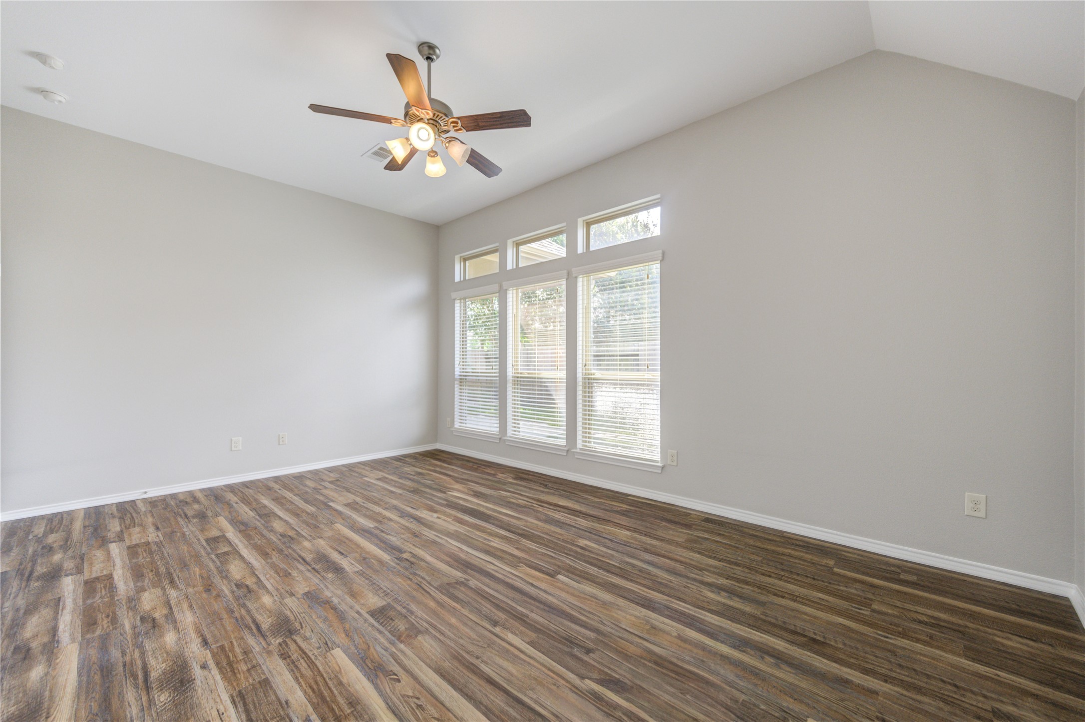 27407 Gatlin Lane Spring, TX 77386 - Photo 22 of 35 Large windows invite in natural light while maintaining a peaceful atmosphere.