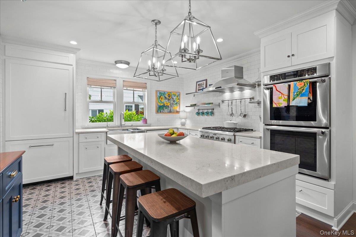 23 Fairlawn Street Rye, NY 10580 - Photo 12 of 38 The kitchen island offers plenty of seating for convenience.