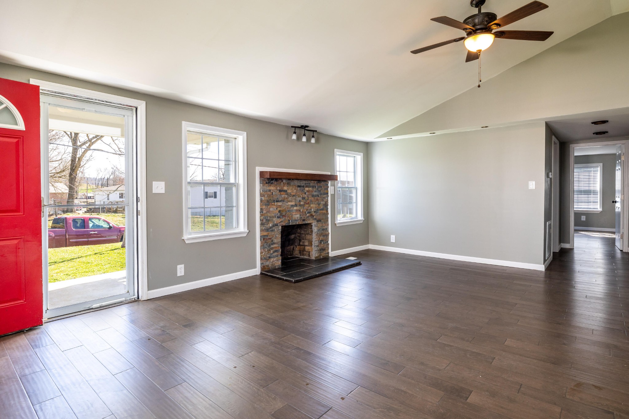 804 Spring Street Philadelphia, TN 37846 - Photo 5 of 33 a view of an empty room with window and wooden floor
