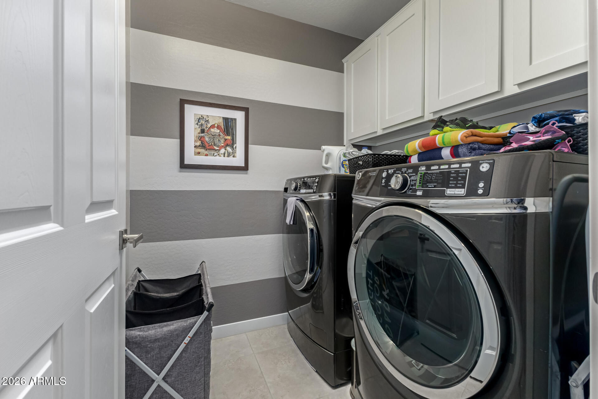 250 West Queen Creek Road, Unit 144 Chandler, AZ 85248 - Photo 20 of 33 a utility room with sink dryer and washer