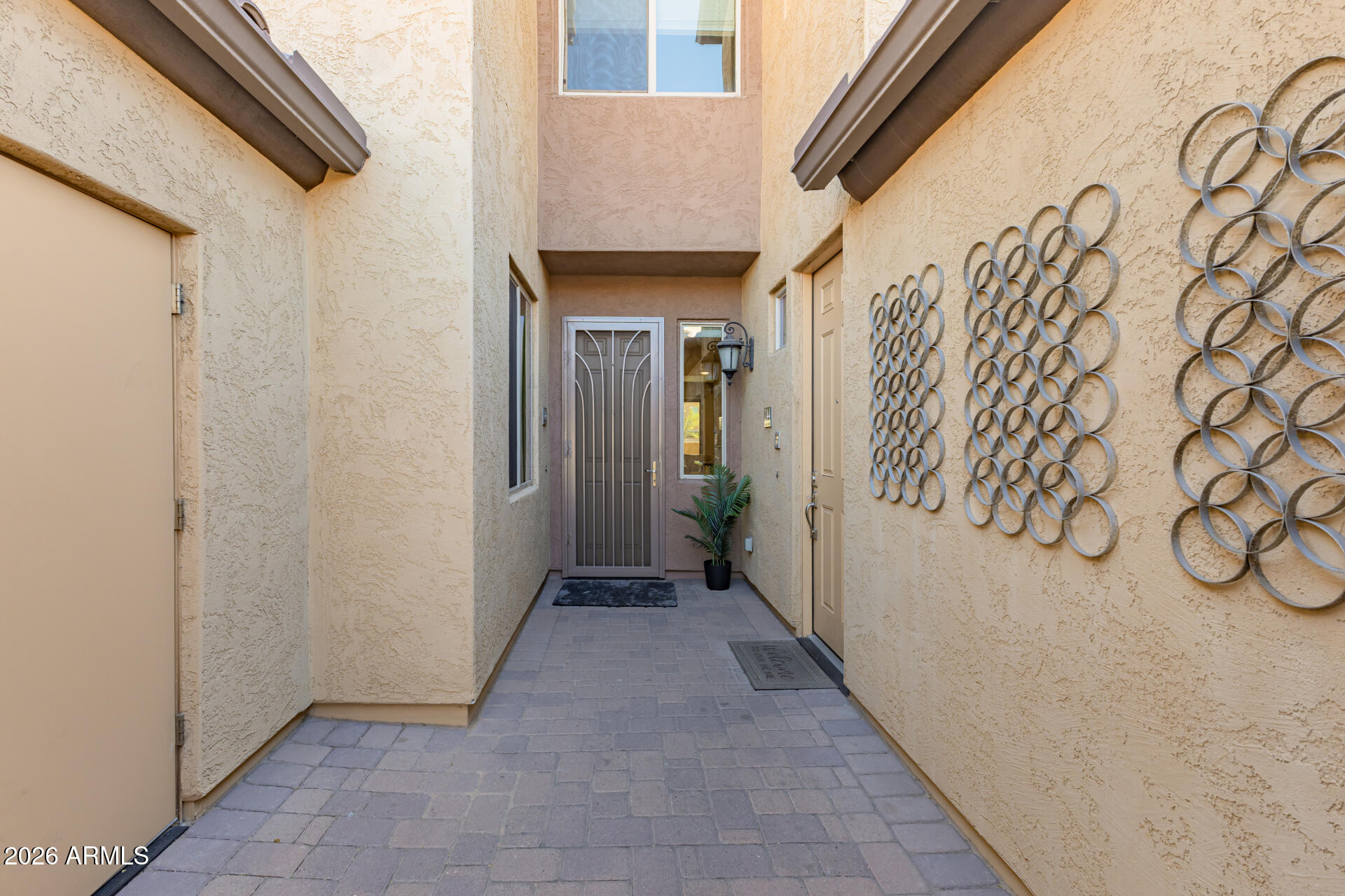 250 West Queen Creek Road, Unit 144 Chandler, AZ 85248 - Photo 2 of 33 a view of a house with a street