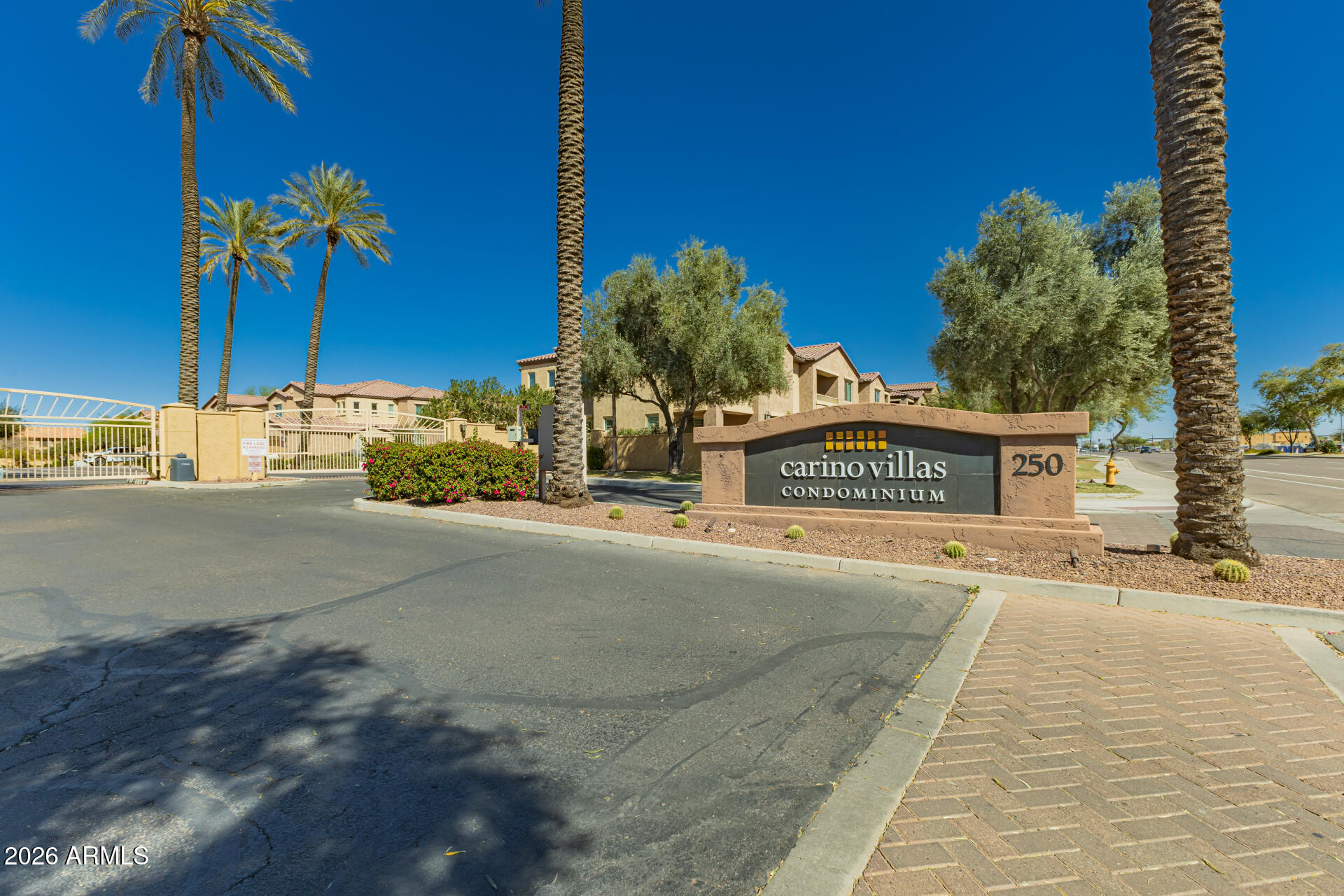 250 West Queen Creek Road, Unit 144 Chandler, AZ 85248 - Photo 24 of 33 a view of a street with a building in the background