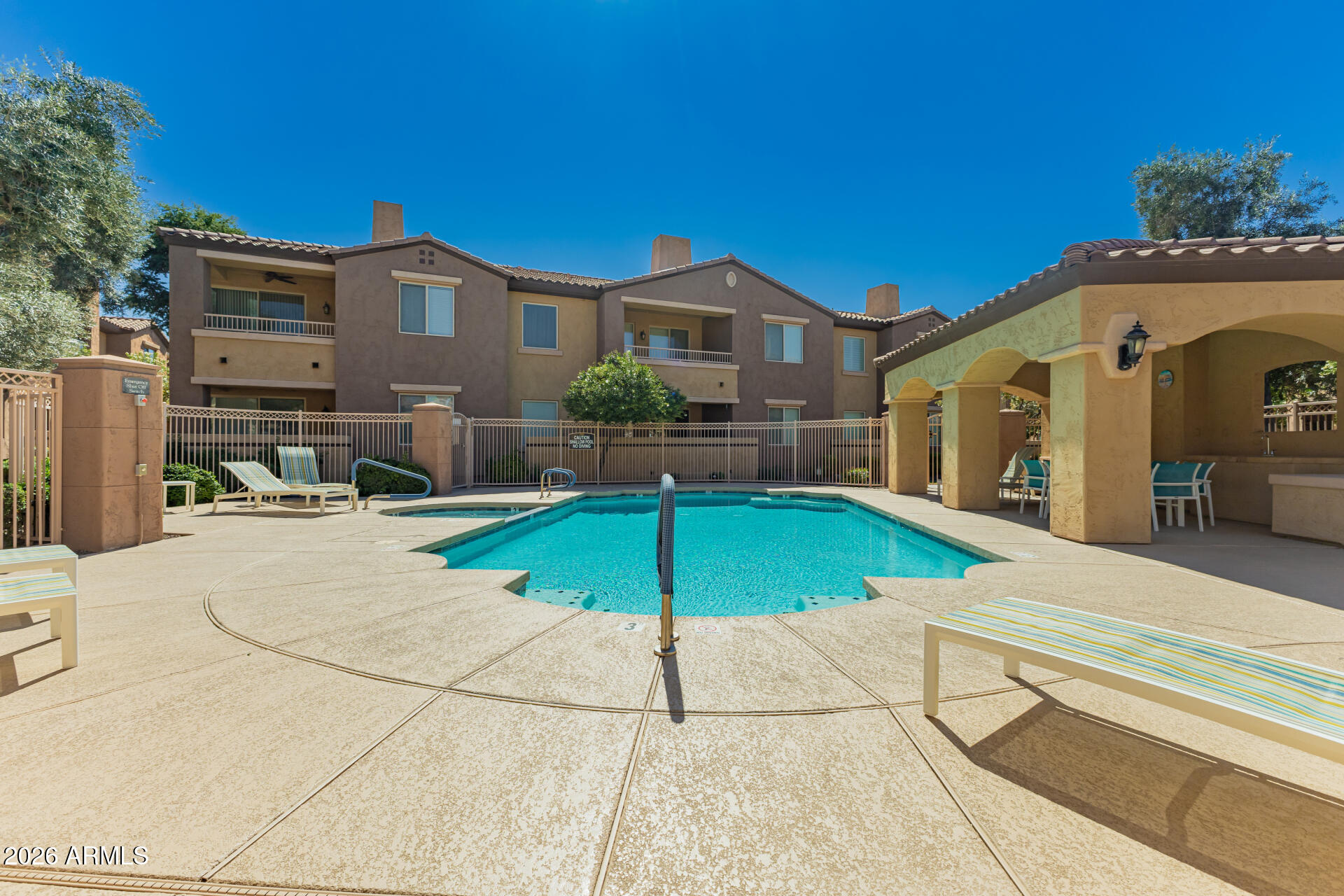 250 West Queen Creek Road, Unit 144 Chandler, AZ 85248 - Photo 26 of 33 a view of a house with a patio