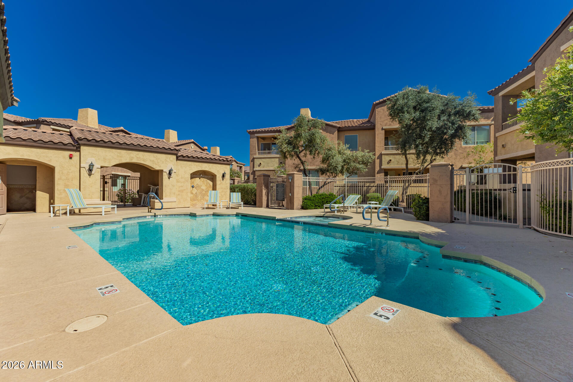 250 West Queen Creek Road, Unit 144 Chandler, AZ 85248 - Photo 3 of 33 a view of a house with a yard