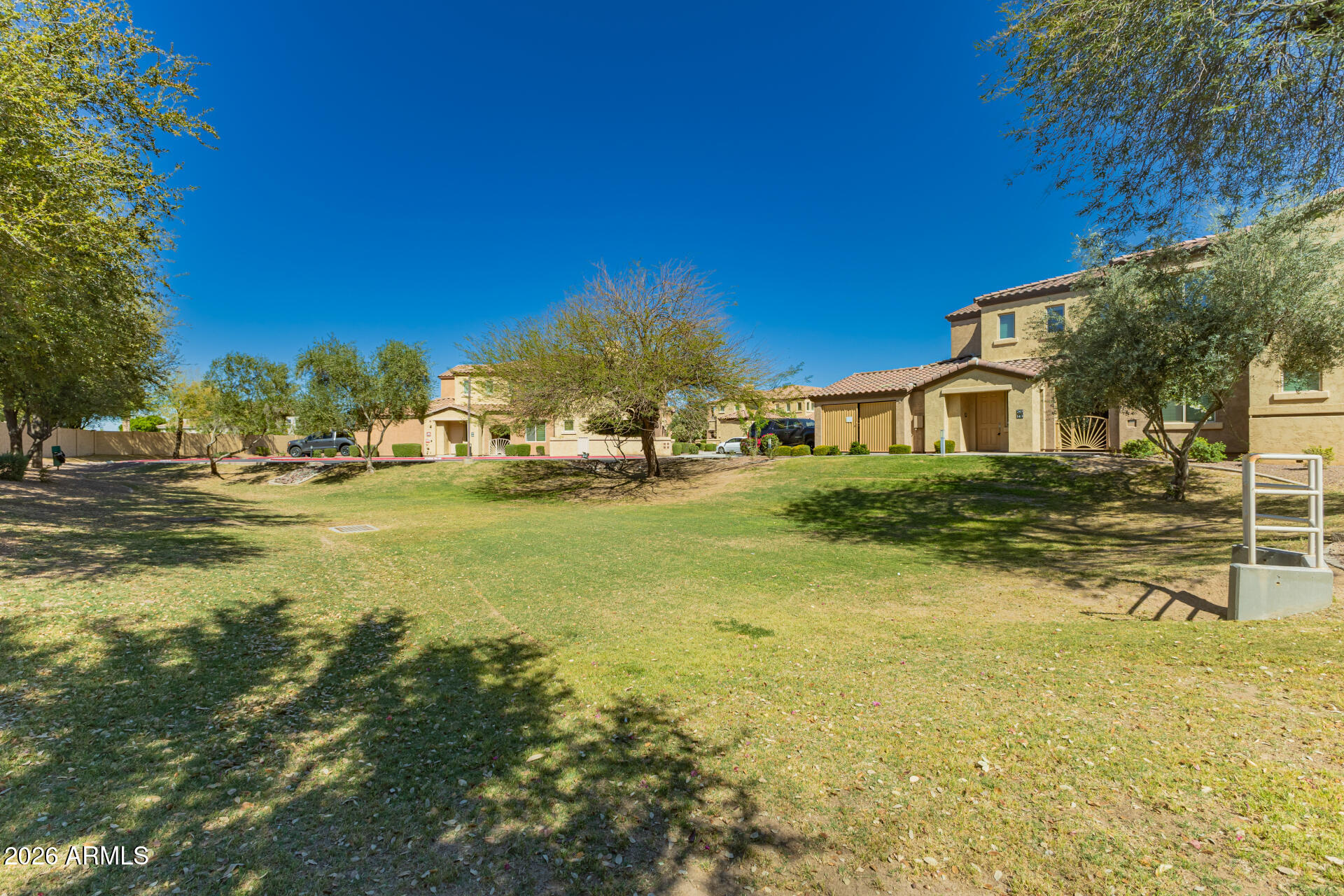 250 West Queen Creek Road, Unit 144 Chandler, AZ 85248 - Photo 32 of 33 a view of a houses with outdoor space